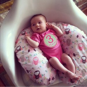 My sweet baby resting on her Boppy at 3 months old