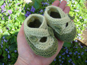 green baby shoes