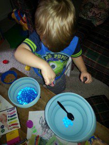Fun with water beads of course includes using different kinds of spoons, cups, and bowls to transfer them from one container to another. Plus, they BOUNCE!