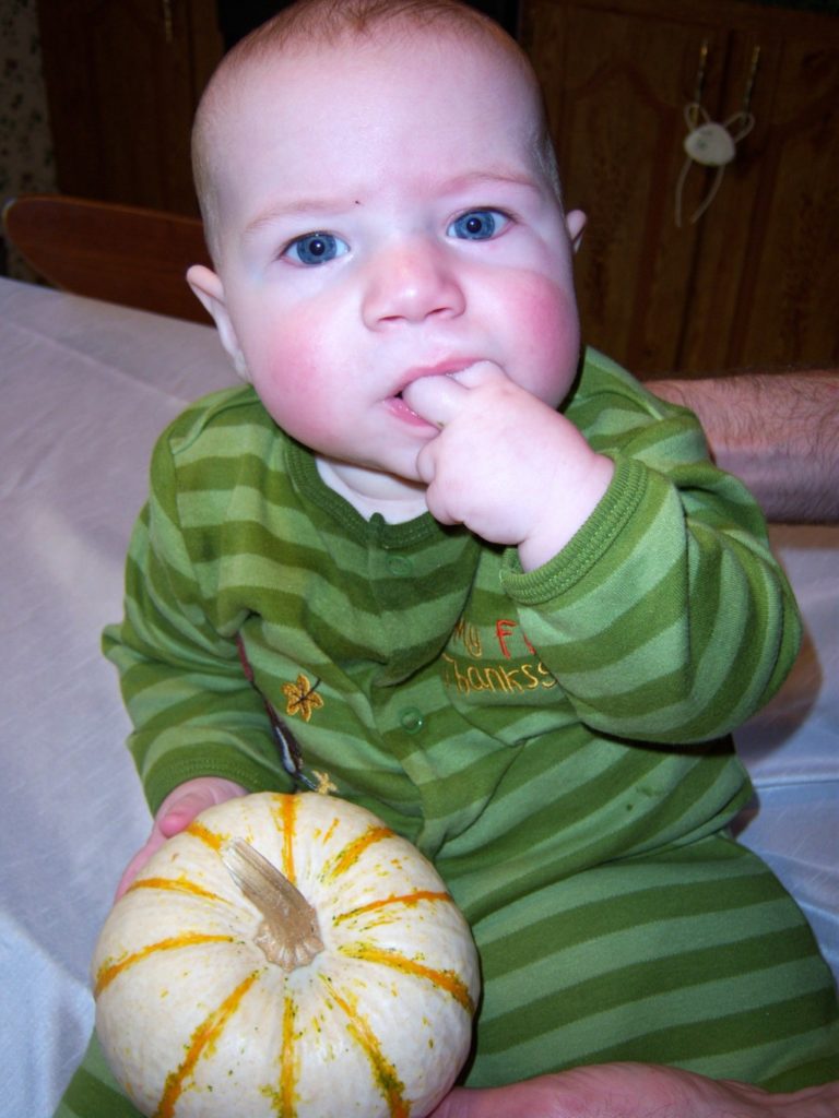 Action Jackson in his first Thanksgiving romper. Those fingers were delicious.