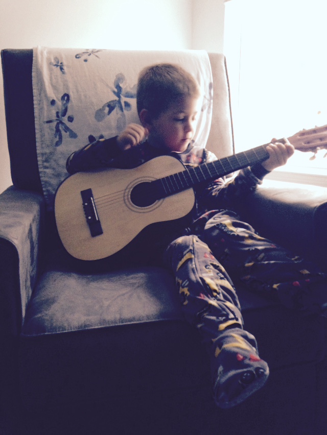 Child Playing Guitar | Columbia SC Moms Blog