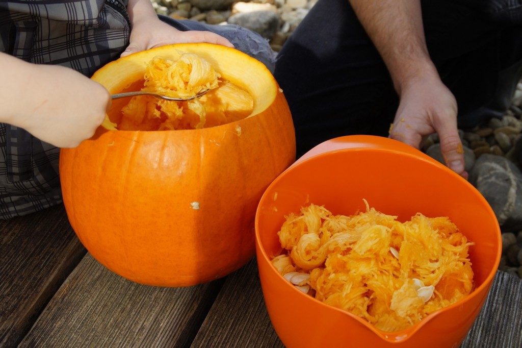 scooping pumpkins