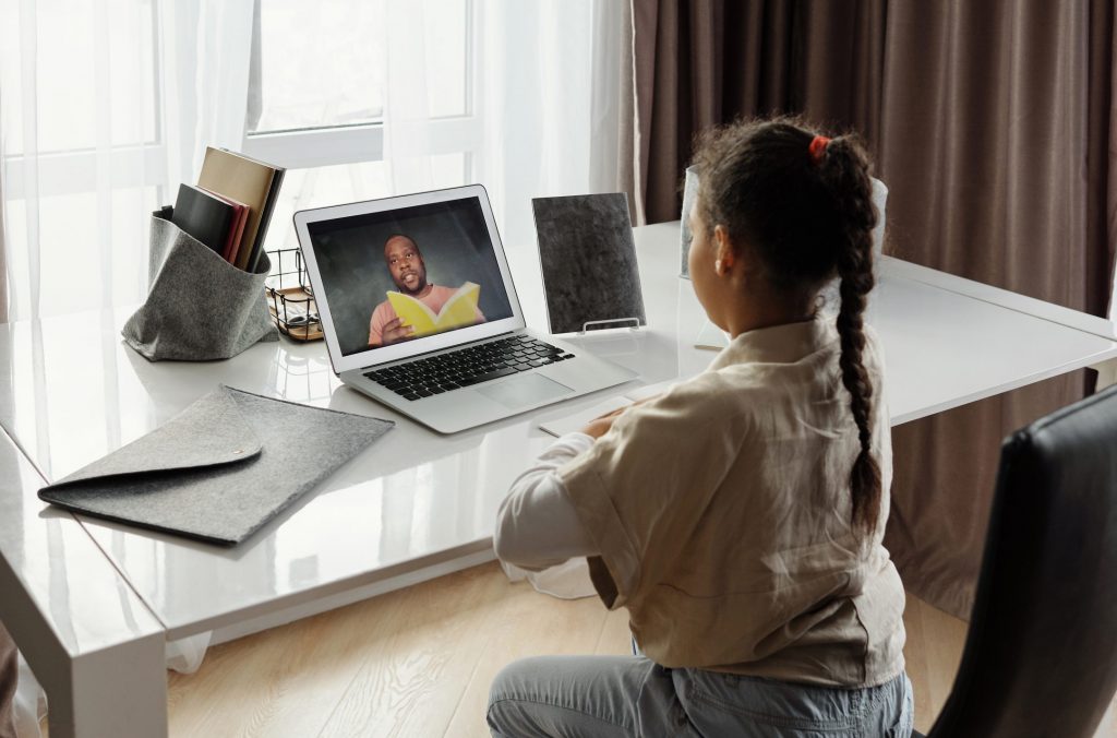 Little girl taking online classes